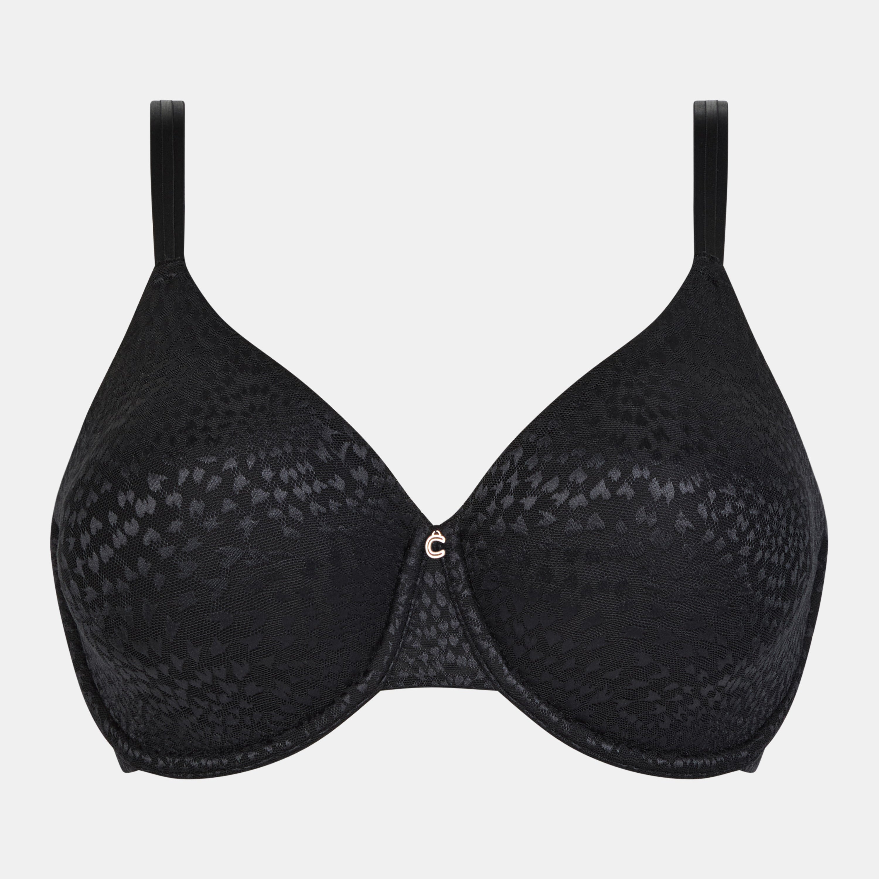Magique minimizer bra in black shown against a white background, featuring smooth patterned cups and a small center charm.