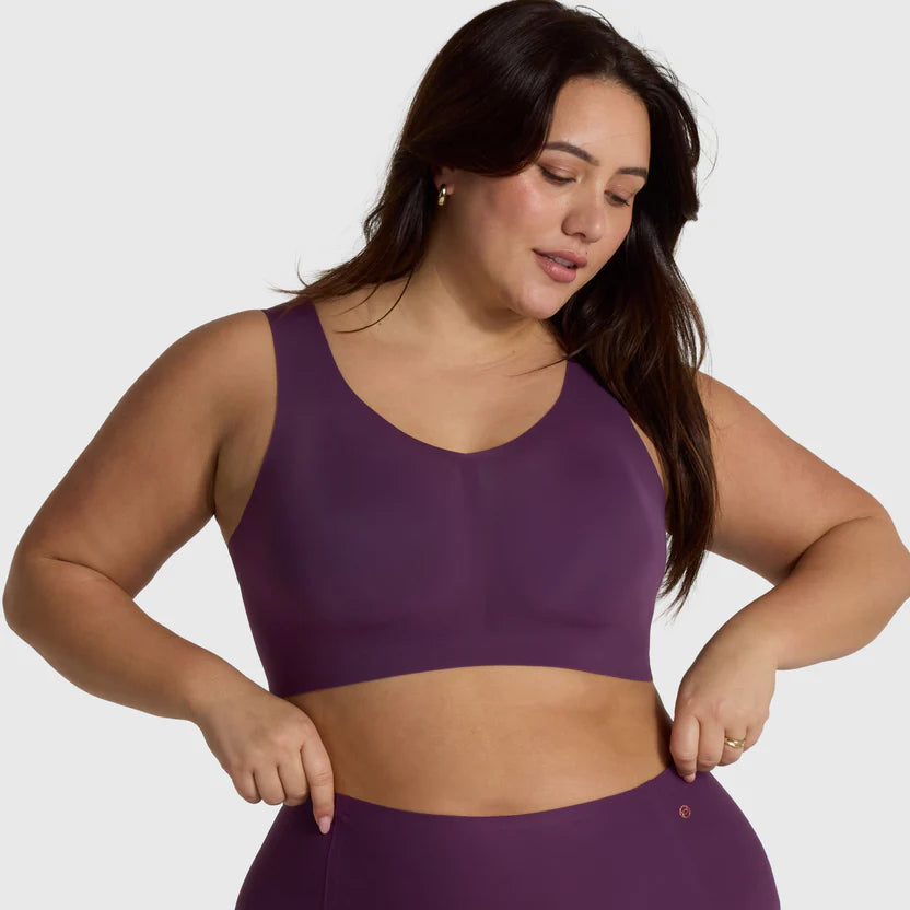 Ergonomic wireless bra with full-coverage, pull-over design for posture support and all-day comfort. Ideal for low-impact activities like yoga and pilates, crafted by women to support larger busts. Available at The O Shop.