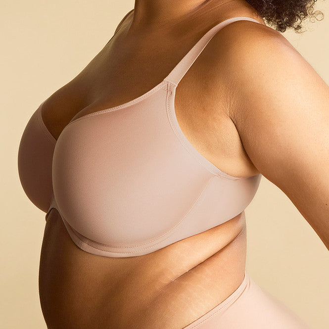 Angled front view of the Sculptresse Elegance Bra in Honey, highlighting lightweight moulded cups, supportive side panels, and soft neutral tone.