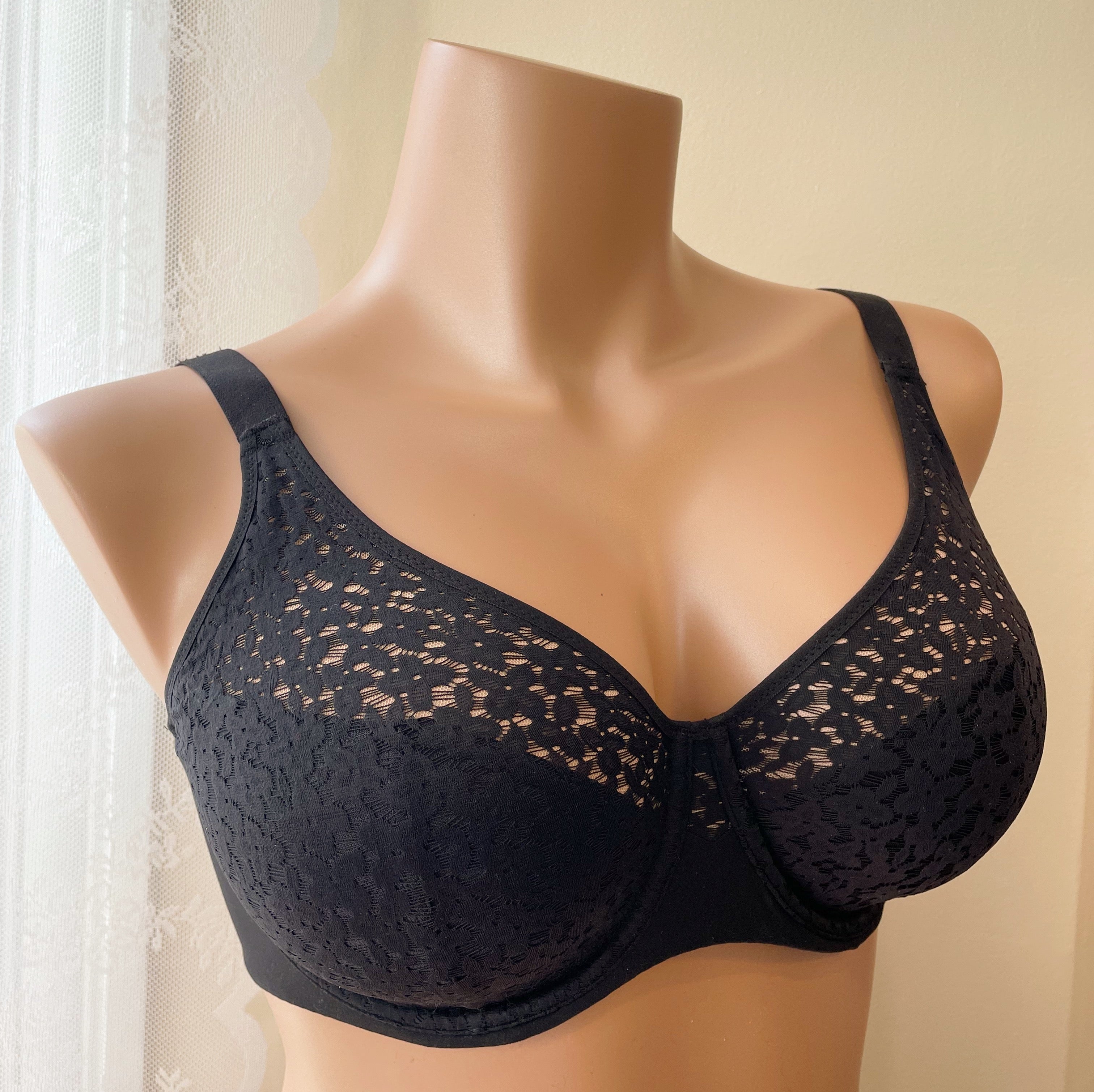 Chantelle Norah Comfort Underwire Bra in black with floral lace, internal seams for lift, and reinforced straps. Available at The O Shop in Central Massachusetts.