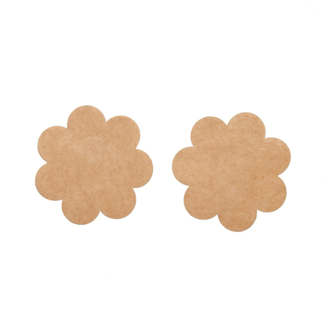 f disposable breast petals showing smooth, rounded shape for invisible coverage under clothing